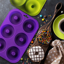Load image into Gallery viewer, Professional 2-Pack Donut Pan Set | Makes 12 Full Size Donuts, BPA Free, Super Non-Stick | Pack Comes With 1 Spatula and 1 Pastry bag (Purple/Green)